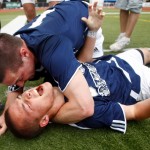 Glacier Peak High School forward Jackson Miller (top) celebrates with teammate and brother Shane Miller after (Shane) Miller scored the game-winning goal over Mount Rainier High School in overtime to win the Washington 3A State Championship May 29, 2010 at Harry Lang Stadium in Lakewood, Wash.