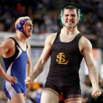 Lake Stevens High School wrestler Jake Welch (right) celebrates his 12-7 win over Graham-Kapowsin High SchoolÕs heavily favored Tyler Story during the first day of the Mat Classic wrestling tournament Feb. 20, 2009 in Tacoma, Wash.