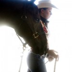 Tara Christiansen walks her horse TC back to his stall after a morning practice Aug. 26, 2006 in Snohomish, Wash.  Christiansen won the “Working Cow Horse” division at the American Quarter Horse Youth Association world championships.