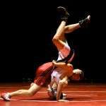 Snohomish High SchoolÕs Kyle Hurd (in red) stands Everett High SchoolÕs Laban Crook on his head during their 145-pound weight class match Jan. 22, 2007 at Snohomish High School, Wash.