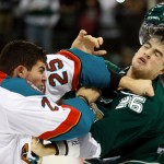 Kelowna RocketÕs Tyler Matheson (25) knocks the helmet off of Everett’s Cameron Abney during a fight in the first period of their WHL hockey game Nov. 13, 2009 in Everett, Wash.